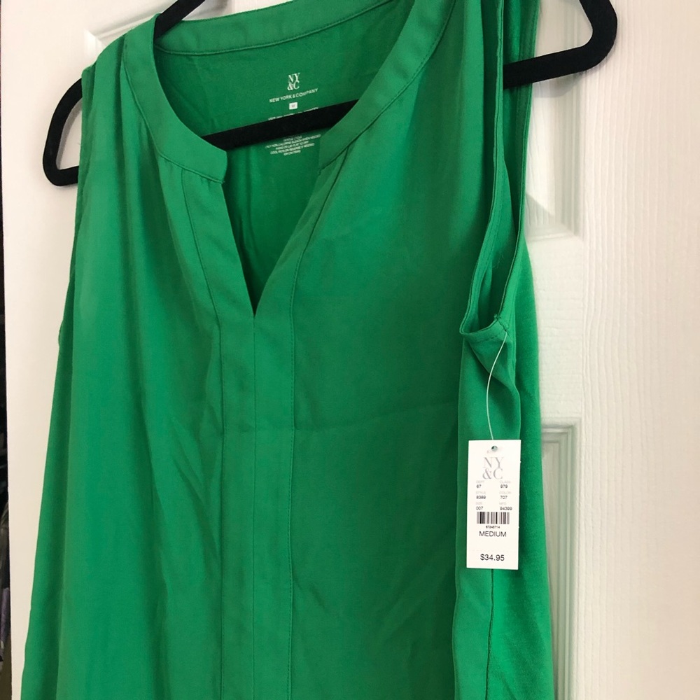 Woman’s blouse, brand new ,size medium.